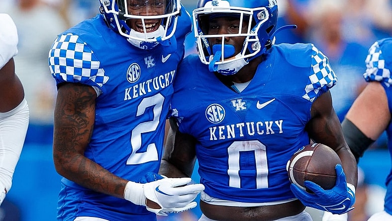Sep 17, 2022; Lexington, Kentucky, USA; Kentucky Wildcats wide receiver Barion Brown (2) celebrates with running back Kavosiey Smoke (0) after a touchdown is scored during the game against the Youngstown State Penguins at Kroger Field. Mandatory Credit: Jordan Prather-USA TODAY Sports