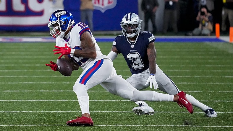 Sep 26, 2022; East Rutherford, NJ, USA;  New York Giants wide receiver Kenny Golladay (19) tries to catch the ball as Dallas Cowboys cornerback Anthony Brown (3) defends during the second half at MetLife Stadium. Mandatory Credit: Robert Deutsch-USA TODAY Sports