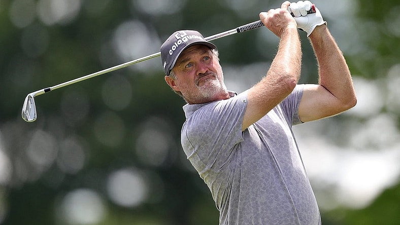Jerry Kelly watches his shot down the fairway on the 15th hole during third round of the Bridgestone Senior Players Championship at Firestone Country Club, Saturday, July 9, 2022, in Akron, Ohio. [Jeff Lange/Beacon Journal]

Bridgestone 3