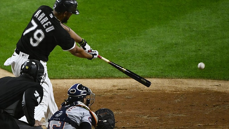 Sep 23, 2022; Chicago, Illinois, USA; Chicago White Sox first baseman Jose Abreu (79) hits an RBI single during the third inning against the Detroit Tigers at Guaranteed Rate Field. Mandatory Credit: Matt Marton-USA TODAY Sports