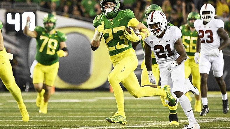 Oct 1, 2022; Eugene, Oregon, USA; Oregon Ducks wide receiver Chase Cota (23) catches a pass for a touchdown during the first half against the Stanford Cardinal at Autzen Stadium. Mandatory Credit: Troy Wayrynen-USA TODAY Sports