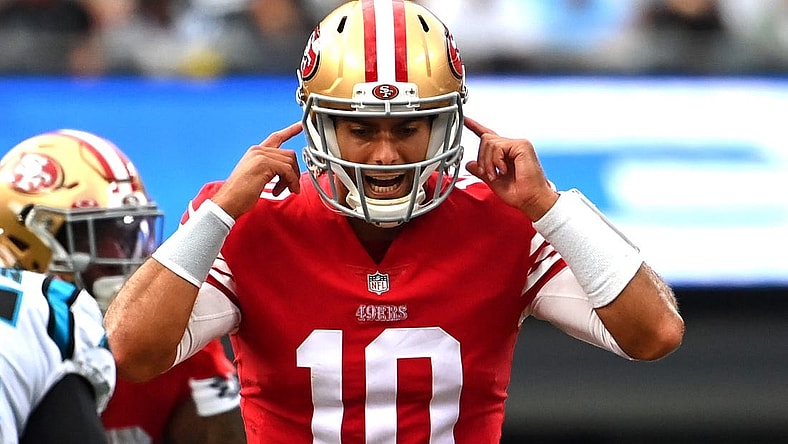 Oct 9, 2022; Charlotte, North Carolina, USA; San Francisco 49ers quarterback Jimmy Garoppolo (10) signals at the line of scrimmage in the second quarter at Bank of America Stadium. Mandatory Credit: Bob Donnan-USA TODAY Sports