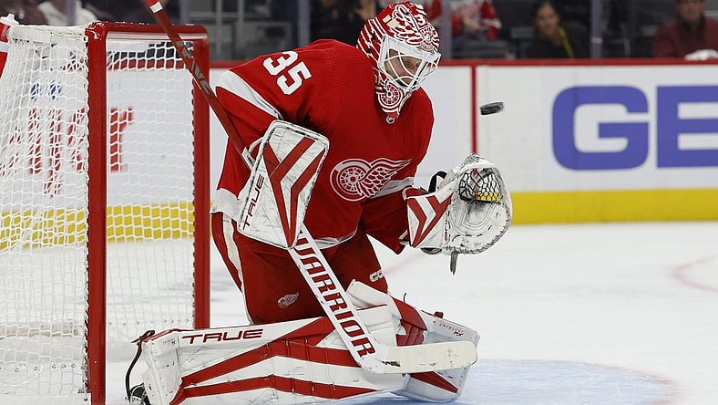 Oct 14, 2022; Detroit, Michigan, USA; Detroit Red Wings goaltender Ville Husso (35) makes a save in the first period against the Montreal Canadiens at Little Caesars Arena. Mandatory Credit: Rick Osentoski-USA TODAY Sports
