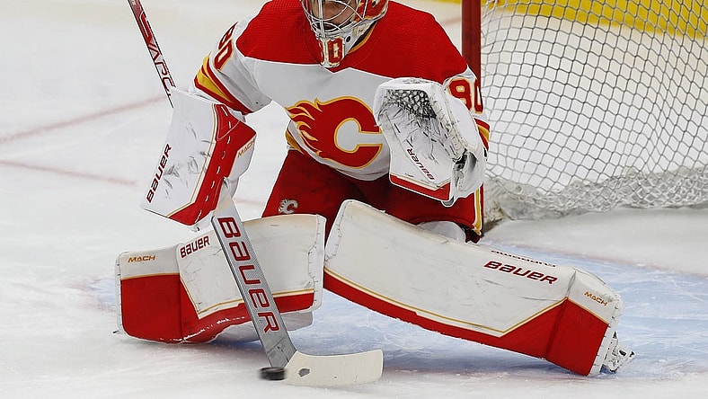 Oct 15, 2022; Edmonton, Alberta, CAN; Calgary Flames goaltender Dan Vladar (80) makes a save during warmup against the Edmonton Oilers at Rogers Place. Mandatory Credit: Perry Nelson-USA TODAY Sports