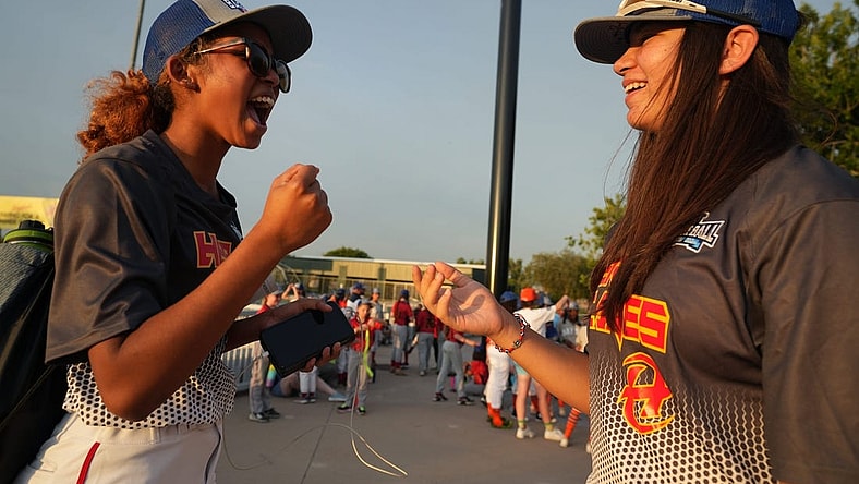 Riley Wilson, 14, left, and Laney Fukuoka, 15, California teammates on the Hurricanes share a laugh during the opening ceremony for Baseball for All, an organization focused on giving girls an opportunity to play baseball, at Hohokam Stadium in Mesa, Ariz. on Wednesday, July 20, 2022.
Baseball For All 17