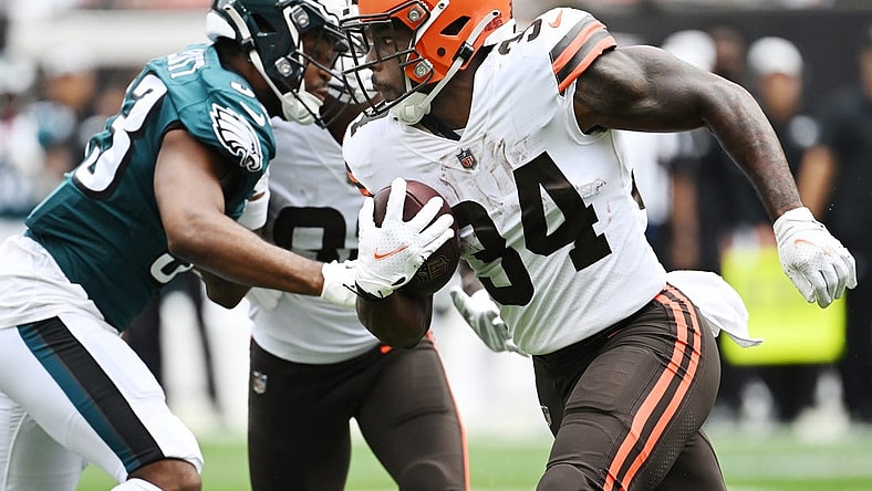 Aug 21, 2022; Cleveland, Ohio, USA; Cleveland Browns running back Jerome Ford (34) runs with the ball as Philadelphia Eagles cornerback Josiah Scott (33) defends during the first half at FirstEnergy Stadium. Mandatory Credit: Ken Blaze-USA TODAY Sports