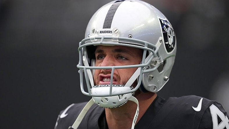 Oct 23, 2022; Paradise, Nevada, USA; Las Vegas Raiders quarterback Derek Carr (4) warms up before a game against the Houston Texans at Allegiant Stadium. Mandatory Credit: Stephen R. Sylvanie-USA TODAY Sports