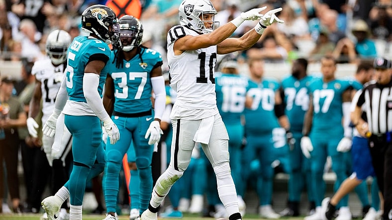 Nov 6, 2022; Jacksonville, Florida, USA; Las Vegas Raiders wide receiver Mack Hollins (10) gestures after a first down during the first half against the Jacksonville Jaguars at TIAA Bank Field. Mandatory Credit: Matt Pendleton-USA TODAY Sports
