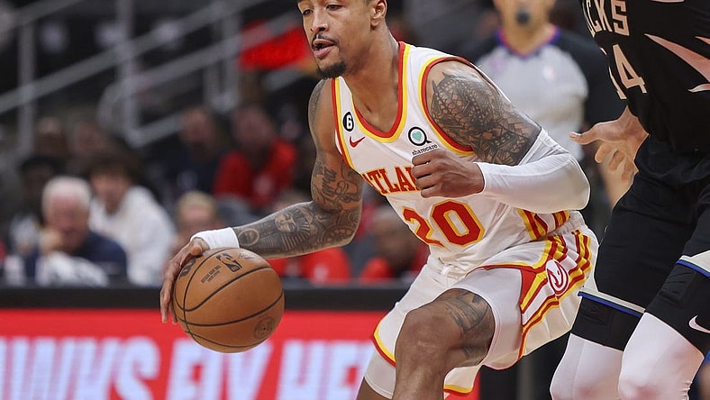Nov 7, 2022; Atlanta, Georgia, USA; Atlanta Hawks forward John Collins (20) drives to the basket against the Milwaukee Bucks in the second quarter at State Farm Arena. Mandatory Credit: Brett Davis-USA TODAY Sports