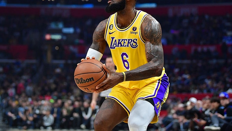 Nov 9, 2022; Los Angeles, California, USA; Los Angeles Lakers forward LeBron James (6) shoots against the Los Angeles Clippers during the first half at Crypto.com Arena. Mandatory Credit: Gary A. Vasquez-USA TODAY Sports