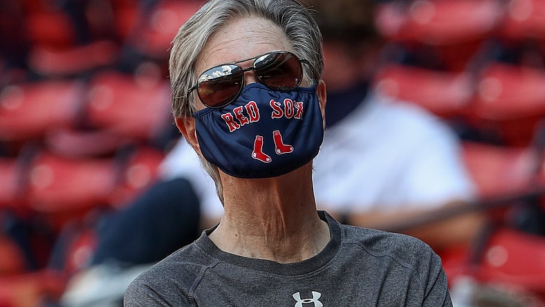 boston red sox owner john henry interested in buying the washington commanders
