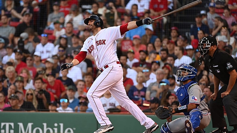 Sep 3, 2022; Boston, Massachusetts, USA; Boston Red Sox designated hitter J.D. Martinez (28) hits an RBI double against the Texas Rangers at Fenway Park. Mandatory Credit: Eric Canha-USA TODAY Sports