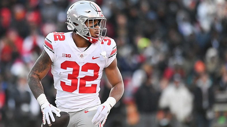 Nov 19, 2022; College Park, Maryland, USA; Ohio State Buckeyes running back TreVeyon Henderson (32) reacts after scoring a first quarter touchdown against the Maryland Terrapins at SECU Stadium. Mandatory Credit: Tommy Gilligan-USA TODAY Sports
