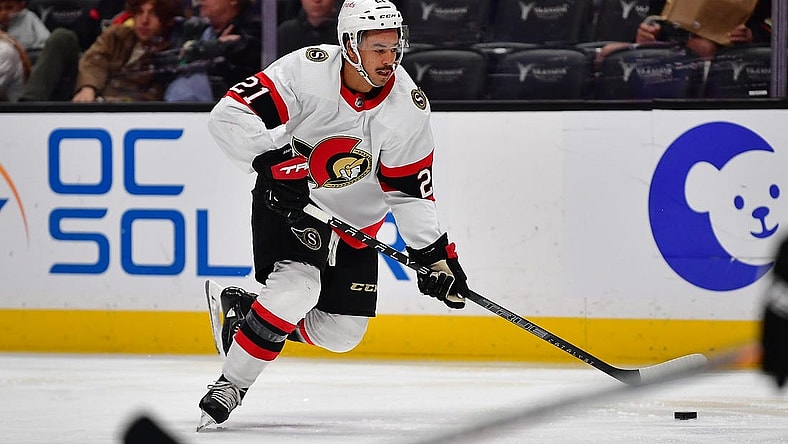 Nov 25, 2022; Anaheim, California, USA; Ottawa Senators right wing Mathieu Joseph (21) moves the puck against the Anaheim Ducks during the third period at Honda Center. Mandatory Credit: Gary A. Vasquez-USA TODAY Sports