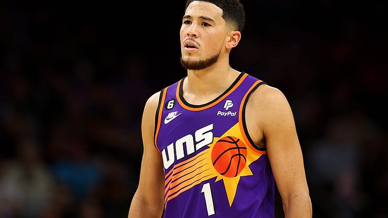 Nov 30, 2022; Phoenix, Arizona, USA; Phoenix Suns guard Devin Booker (1) against the Chicago Bulls at Footprint Center. Mandatory Credit: Mark J. Rebilas-USA TODAY Sports