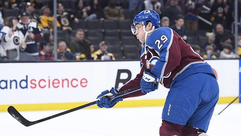 Dec 3, 2022; Boston, Massachusetts, USA; Colorado Avalanche center Nathan MacKinnon (29) shoots the puck during warmups prior to a game against the Boston Bruins at TD Garden. Mandatory Credit: Bob DeChiara-USA TODAY Sports