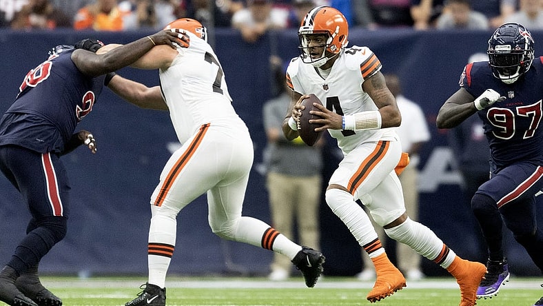 Dec 4, 2022; Houston, Texas, USA; Cleveland Browns quarterback Deshaun Watson (4) scrambles against the Houston Texans in the first quarter at NRG Stadium. Mandatory Credit: Thomas Shea-USA TODAY Sports