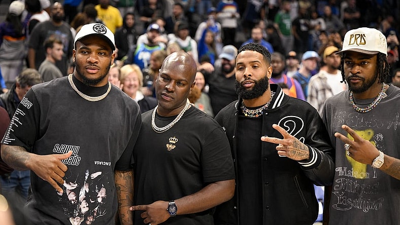 Dec 5, 2022; Dallas, Texas, USA; (from left) Dallas Cowboys linebacker Micah Parsons (white hat) and wide receiver free agent Odell Beckham Jr. (black jacket) and cornerback Trevon Diggs (white hat) pose for a photo after the game between the Dallas Mavericks and the Phoenix Suns at the American Airlines Center. Mandatory Credit: Jerome Miron-USA TODAY Sports