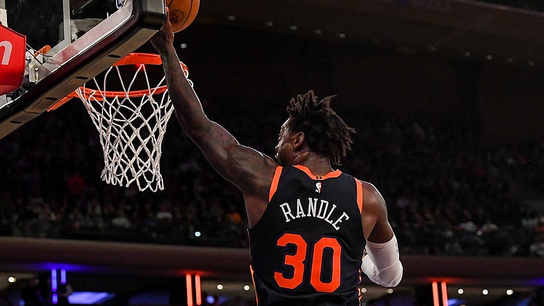 Dec 7, 2022; New York, New York, USA;  New York Knicks forward Julius Randle (30) attempts a lay up against the Atlanta Hawks during the third quarter  at Madison Square Garden. Mandatory Credit: Dennis Schneidler-USA TODAY Sports