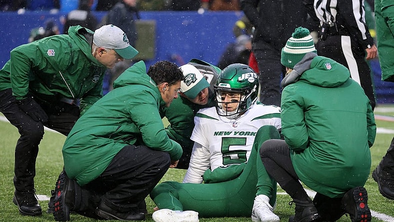 Jets quarterback Mike White left the game several times after being hit by the Bills defense.  He was able to come back and finish the game.