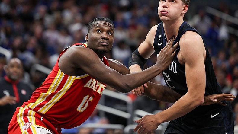 Dec 14, 2022; Orlando, Florida, USA;  Atlanta Hawks center Clint Capela (15) boxes out Orlando Magic center Moritz Wagner (21) in the fourth quarter at Amway Center. Mandatory Credit: Nathan Ray Seebeck-USA TODAY Sports