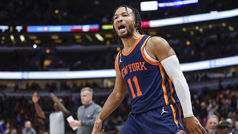 Dec 14, 2022; Chicago, Illinois, USA; New York Knicks guard Jalen Brunson (11) reacts after making a three-pointer against the Chicago Bulls in overtime at United Center. Mandatory Credit: Kamil Krzaczynski-USA TODAY Sports