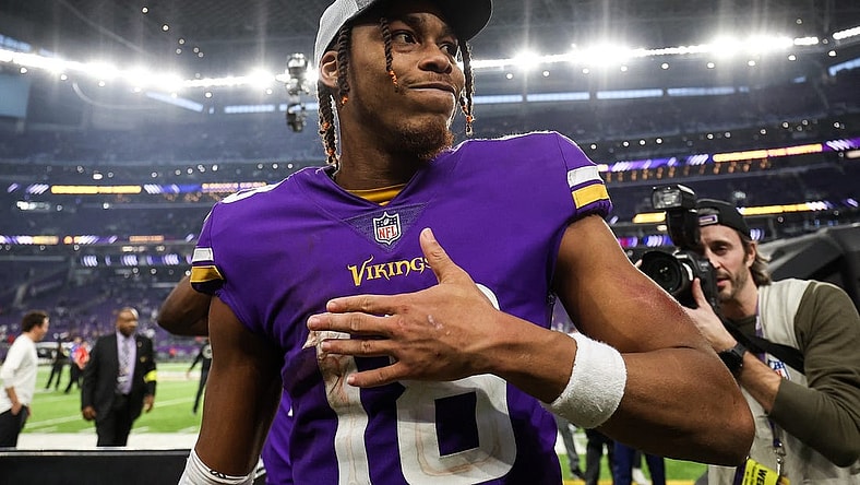 Dec 17, 2022; Minneapolis, Minnesota, USA; Minnesota Vikings wide receiver Justin Jefferson (18) celebrates the win against the Indianapolis Colts after the game at U.S. Bank Stadium. With the win, the Minnesota Vikings clinched the NFC North. Mandatory Credit: Matt Krohn-USA TODAY Sports