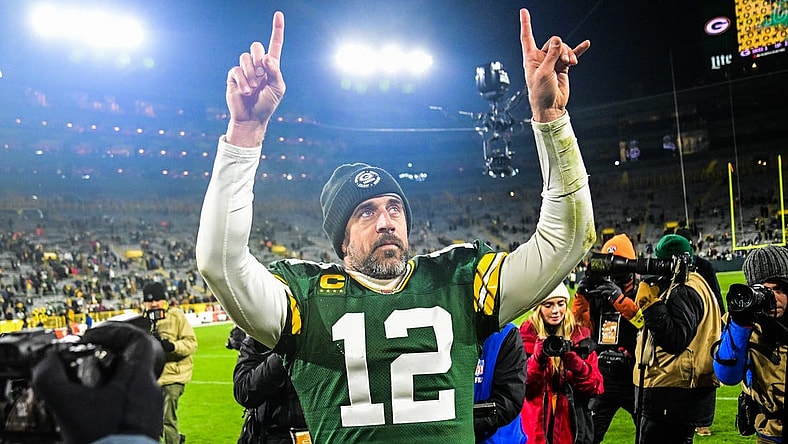 Dec 19, 2022; Green Bay, Wisconsin, USA; Green Bay Packers quarterback Aaron Rodgers (12) walks off the field after the Packers defeated the Los Angeles Rams at Lambeau Field. Mandatory Credit: Benny Sieu-USA TODAY Sports