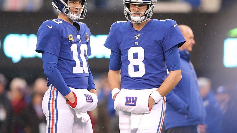 Dec 29, 2019; East Rutherford, New Jersey, USA; New York Giants quarterbacks Eli Manning (10) and Daniel Jones (8) warm up prior to their game against the Philadelphia Eagles at MetLife Stadium. Mandatory Credit: Brad Penner-USA TODAY Sports
