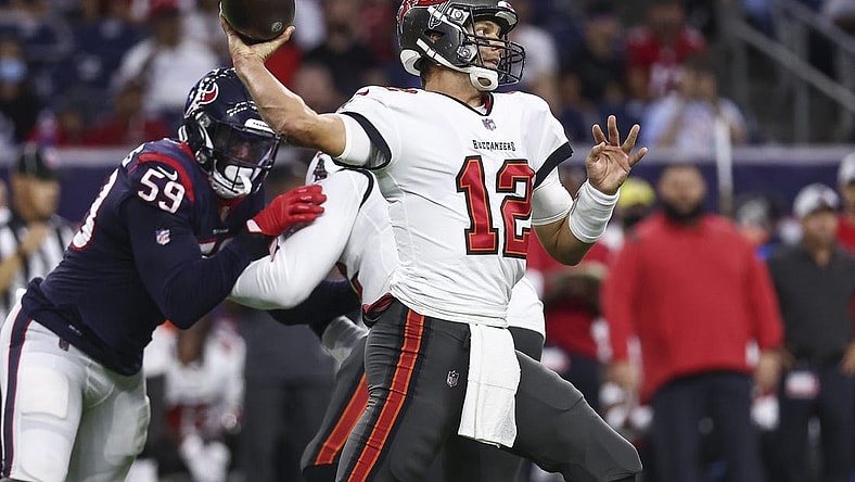 Aug 28, 2021; Houston, Texas, USA; Tampa Bay Buccaneers quarterback Tom Brady (12) attempts a pass during the first quarter against the Houston Texans at NRG Stadium. Mandatory Credit: Troy Taormina-USA TODAY Sports