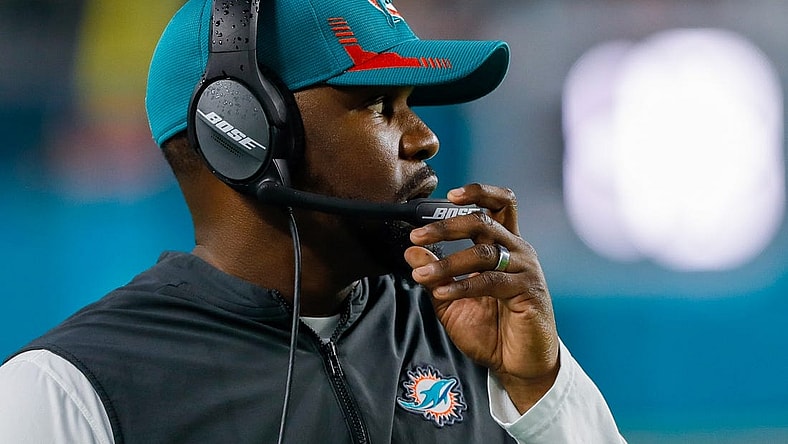 Jan 9, 2022; Miami Gardens, Florida, USA; Miami Dolphins head coach Brian Flores watches from the sideline during the second quarter of the game against the New England Patriots at Hard Rock Stadium. Mandatory Credit: Sam Navarro-USA TODAY Sports