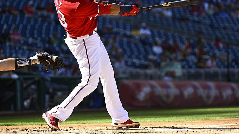 Sep 1, 2022; Washington, District of Columbia, USA; Washington Nationals designated hitter Nelson Cruz (23) singles against the Oakland Athletics during the first inning at Nationals Park. Mandatory Credit: Brad Mills-USA TODAY Sports