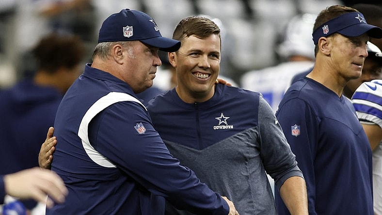 Sep 18, 2022; Arlington, Texas, USA; Dallas Cowboys head coach Mike McCarthy talks to offensive coordinator Kellen Moore before the game against the Cincinnati Bengals  at AT&T Stadium. Mandatory Credit: Tim Heitman-USA TODAY Sports
