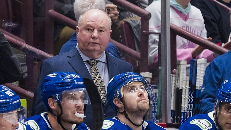 Oct 24, 2022; Vancouver, British Columbia, CAN; Vancouver Canucks head coach Bruce Boudreau on the bench against Carolina Hurricanes in the first period at Rogers Arena. Mandatory Credit: Bob Frid-USA TODAY Sports