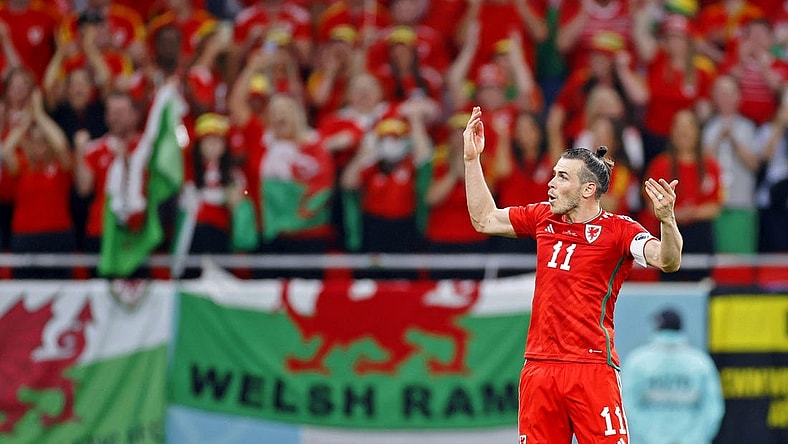 Nov 21, 2022; Al Rayyan, Qatar; Wales forward Gareth Bale (11) celebrates after scoring a goal against the United States of America on a penalty kick during the second half during a group stage match during the 2022 FIFA World Cup at Ahmed Bin Ali Stadium. Mandatory Credit: Yukihito Taguchi-USA TODAY Sports