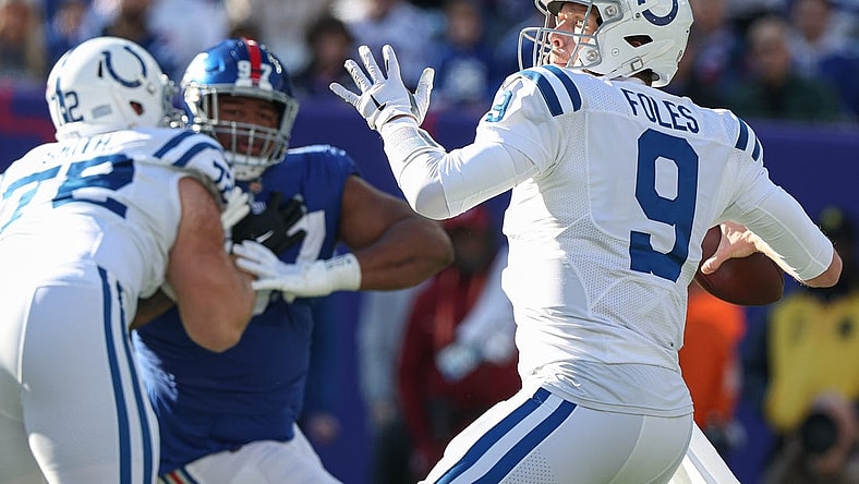 Jan 1, 2023; East Rutherford, New Jersey, USA; Indianapolis Colts quarterback Nick Foles (9) throws the ball during the first quarter against the New York Giants at MetLife Stadium. Mandatory Credit: Vincent Carchietta-USA TODAY Sports