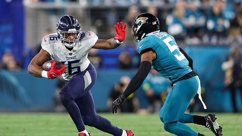 Jan 7, 2023; Jacksonville, Florida, USA;  Tennessee Titans wide receiver Treylon Burks (16) runs with the ball against the Jacksonville Jaguars in the second quarter at TIAA Bank Field. Mandatory Credit: Nathan Ray Seebeck-USA TODAY Sports