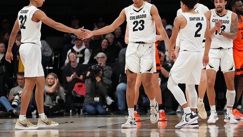 Jan 7, 2023; Boulder, Colorado, USA; Colorado Buffaloes forward Tristan da Silva (23) and guard Nique Clifford (32) and guard KJ Simpson (2) celebrate a score in the second half against the Oregon State Beavers at CU Events Center. Mandatory Credit: Ron Chenoy-USA TODAY Sports