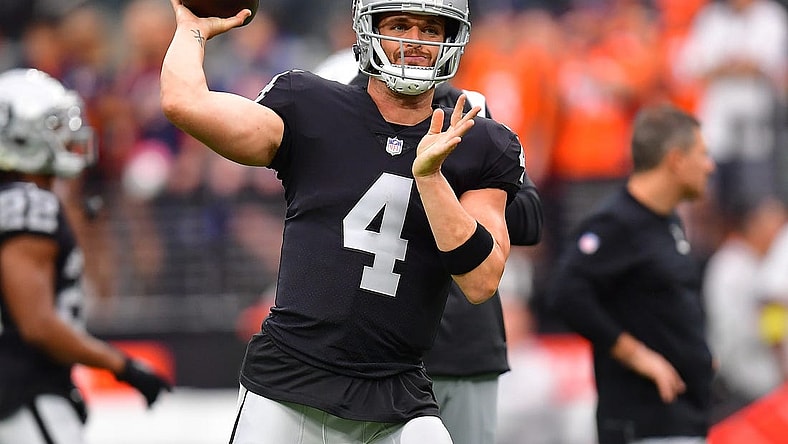 Oct 2, 2022; Paradise, Nevada, USA; Las Vegas Raiders quarterback Derek Carr (4) before playing against the Denver Broncos at Allegiant Stadium. Mandatory Credit: Gary A. Vasquez-USA TODAY Sports