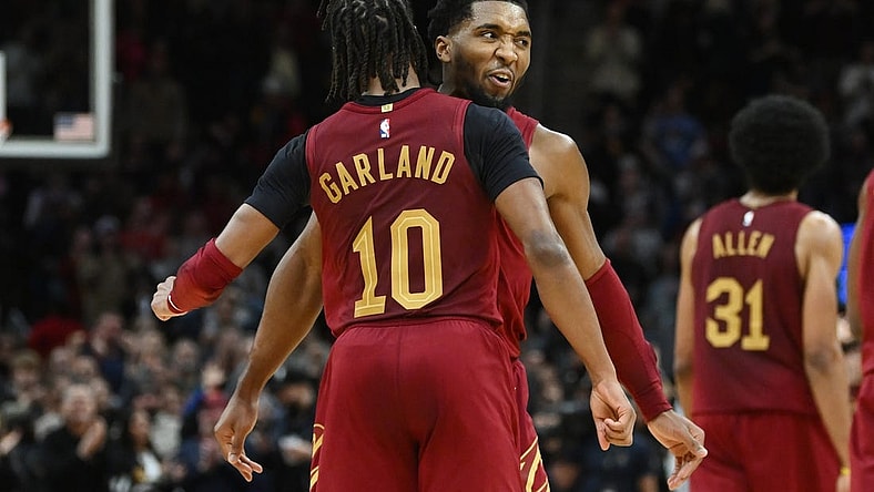 Dec 16, 2022; Cleveland, Ohio, USA; Cleveland Cavaliers guard Darius Garland (10) celebrates with guard Donovan Mitchell (45) during the second half against the Indiana Pacers at Rocket Mortgage FieldHouse. Mandatory Credit: Ken Blaze-USA TODAY Sports