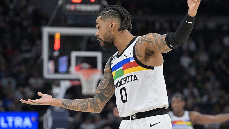 Feb 3, 2023; Minneapolis, Minnesota, USA; Minnesota Timberwolves guard D'Angelo Russell (0) reacts during the third quarter against the Orlando Magic at Target Center. Mandatory Credit: Jeffrey Becker-USA TODAY Sports