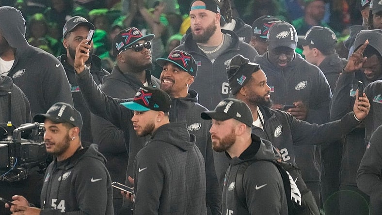 Philadelphia Eagles quarterback Jalen Hurts takes a picture on stage at the Footprint Center in downtown Phoenix during the NFL's Super Bowl Opening Night on Feb. 6, 2023.
Nfl Super Bowl Opening Night At Footprint Center