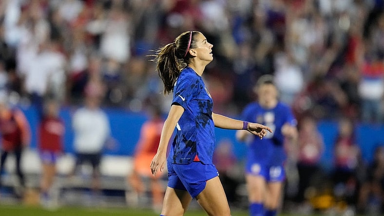 Feb 22, 2023; Frisco, Texas, USA; United States of America forward Alex Morgan (13) reacts after scoring a goal against Brazil during the first half at Toyota Stadium. Mandatory Credit: Chris Jones-USA TODAY Sports