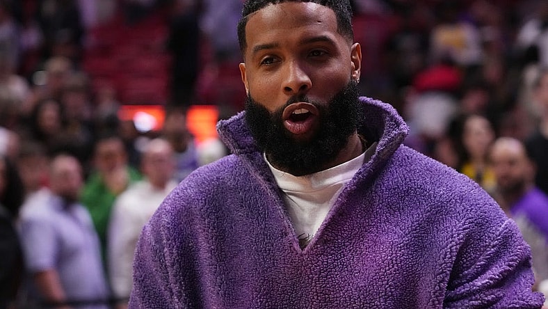 Dec 28, 2022; Miami, Florida, USA;  Football player Odell Beckham stands on the court after the game between the Miami Heat and the Los Angeles Lakers at FTX Arena. Mandatory Credit: Jasen Vinlove-USA TODAY Sports
