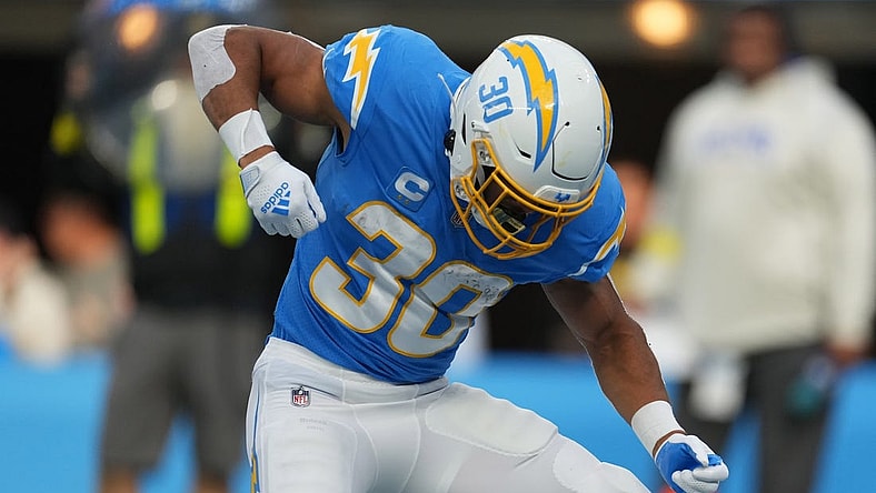 Jan 1, 2023; Inglewood, California, USA; Los Angeles Chargers running back Austin Ekeler (30) celebrates after a touchdown against the Los Angeles Rams in the first half at SoFi Stadium. Mandatory Credit: Kirby Lee-USA TODAY Sports