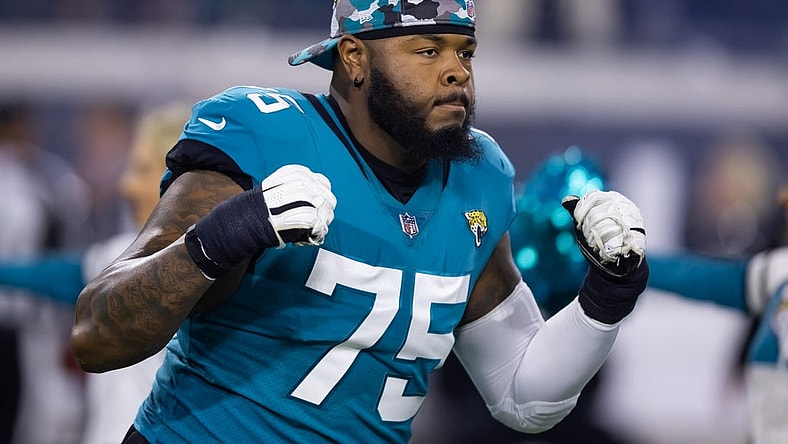 Jan 14, 2023; Jacksonville, Florida, USA; Jacksonville Jaguars offensive tackle Jawaan Taylor (75) against the Los Angeles Chargers during a wild card playoff game at TIAA Bank Field. Mandatory Credit: Mark J. Rebilas-USA TODAY Sports