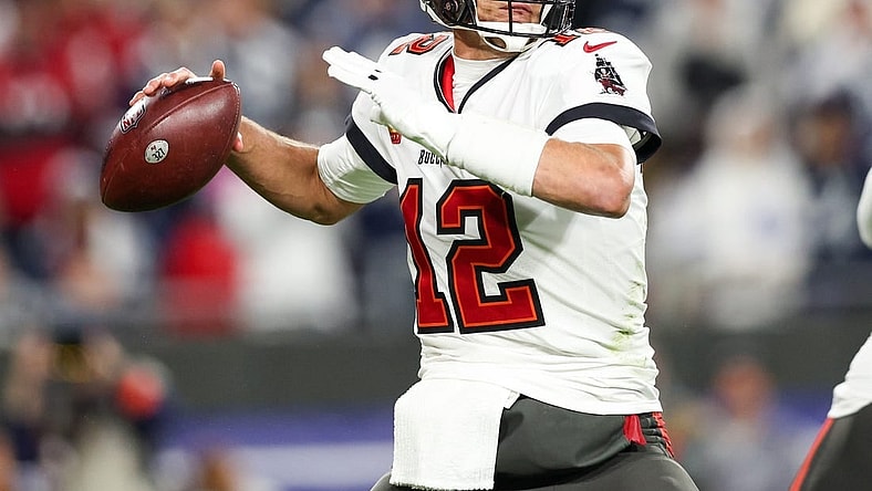 Jan 16, 2023; Tampa, Florida, USA; Tampa Bay Buccaneers quarterback Tom Brady (12) drops back to pass against the Dallas Cowboys in the third quarter during a wild card game at Raymond James Stadium. Mandatory Credit: Nathan Ray Seebeck-USA TODAY Sports