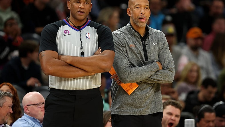 Jan 19, 2023; Phoenix, Arizona, USA; Phoenix Suns head coach Monty Williams (right) alongside NBA referee Kevin Cutler against the Brooklyn Nets at Footprint Center. Mandatory Credit: Mark J. Rebilas-USA TODAY Sports