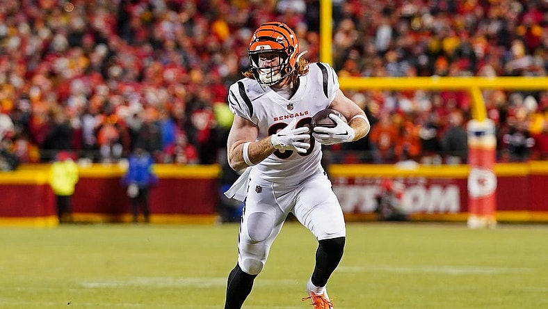 Jan 29, 2023; Kansas City, Missouri, USA; Cincinnati Bengals tight end Hayden Hurst (88) runs with the ball during the first half of the AFC Championship game against the Kansas City Chiefs at GEHA Field at Arrowhead Stadium. Mandatory Credit: Jay Biggerstaff-USA TODAY Sports