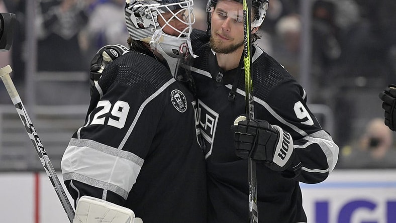 Feb 11, 2023; Los Angeles, California, USA; Los Angeles Kings goaltender Pheonix Copley (29) is congratulated by Los Angeles Kings right wing Adrian Kempe (9) after a shutout against the Pittsburgh Penguins at Crypto.com Arena. Kempe scored four goals in the game as the first player in Kings franchise history to accomplish that record. Mandatory Credit: Jayne Kamin-Oncea-USA TODAY Sports